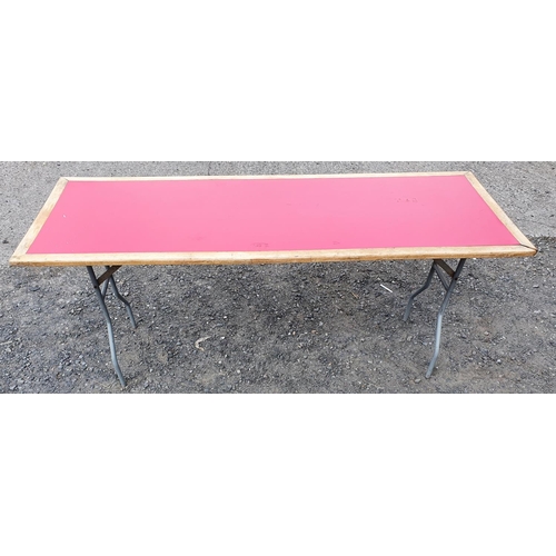 387 - A wooden Fold Up Table with red top. Please note this is a generic photo. 6ft length. (180W x 68D x ... 