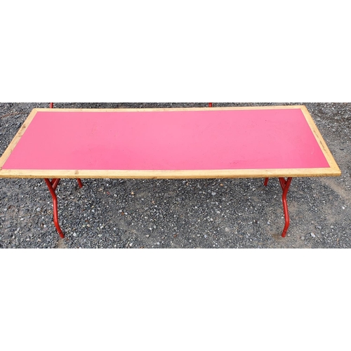 388 - A wooden Fold Up Table with red top. Please note this is a generic photo. 185W x 60D x 65H cms appro... 