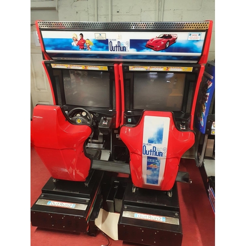19 - A dual player 'Out-Run 2' Arcade Machine. Please note all arcade machines are sold as seen and not s... 