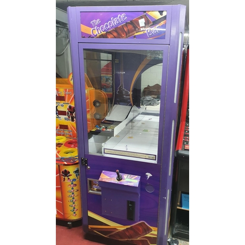 28 - 'The Chocolate Bar' Arcade Machine. Plug is broken. Please note all arcade machines are sold as seen... 