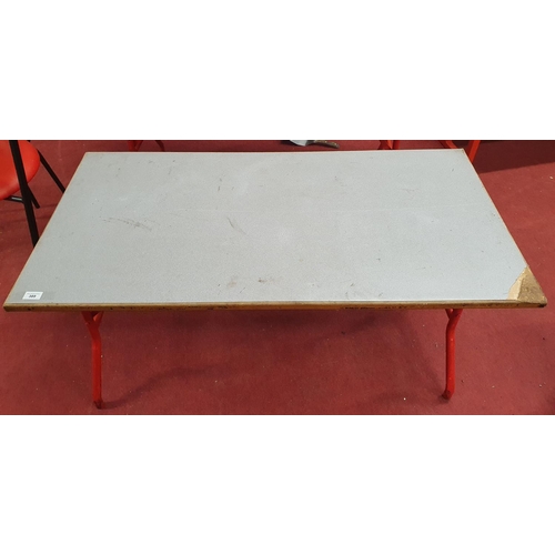 389 - A wooden Fold Up Table with grey top. 4ft x 2ft x 2ft approx. (W X D X H).