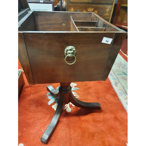 344 - A Regency Mahogany Wine Cooler on stand with lions head handles and reeded pod. 43W x 76H x 38D cms ... 