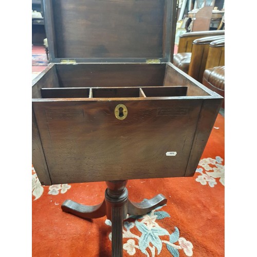 344 - A Regency Mahogany Wine Cooler on stand with lions head handles and reeded pod. 43W x 76H x 38D cms ... 