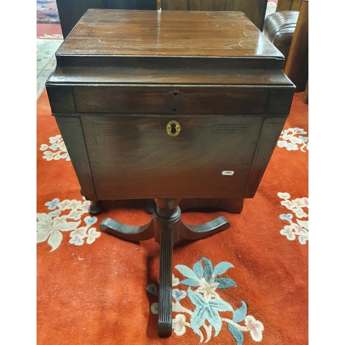 344 - A Regency Mahogany Wine Cooler on stand with lions head handles and reeded pod. 43W x 76H x 38D cms ... 
