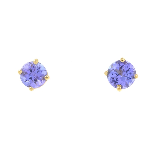 302 - A pair of tanzanite stud earrings.
Stamped 14K.Diameter 0.4cm.