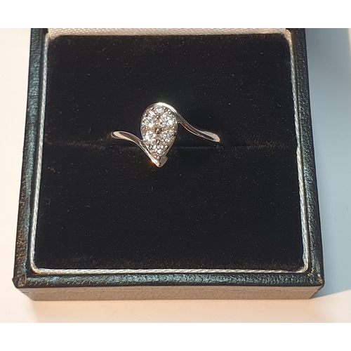 306 - An 18ct gold brilliant-cut diamond pear-shape cluster ring. Total diamond weight 0.33ct, stamped to ... 