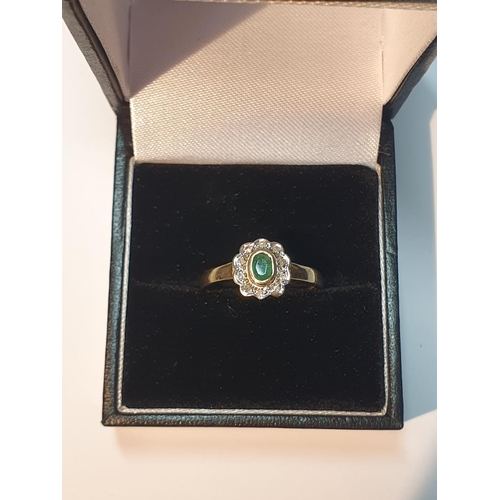 308 - 9ct gold emerald and diamond cluster ring, hallmarks for London, ring size N, 2gms.