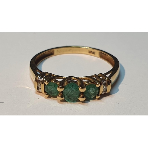 309 - Emerald and diamond band ring, stamped 18K, ring size M, 1.5gms.
