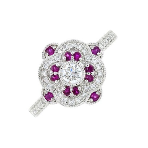 311 - An 18ct gold diamond and ruby cluster ring. Total ruby weight 0.16ct.Total diamond weight 0.39ct.Hal... 