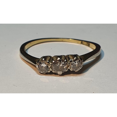 320 - A diamond three-stone ring. Estimated total diamond weight 0.35ct, principal diamond estimated H-I c... 