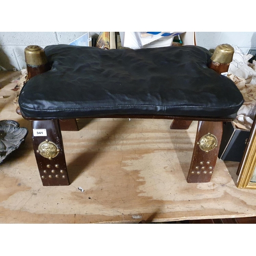 341 - A good leather topped Camel Stool along with a globe.