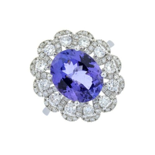 300 - An 18ct Gold tanzanite and diamond dress ring. Tanzanite weight 3.71cts. Total diamond weight 0.99ct... 