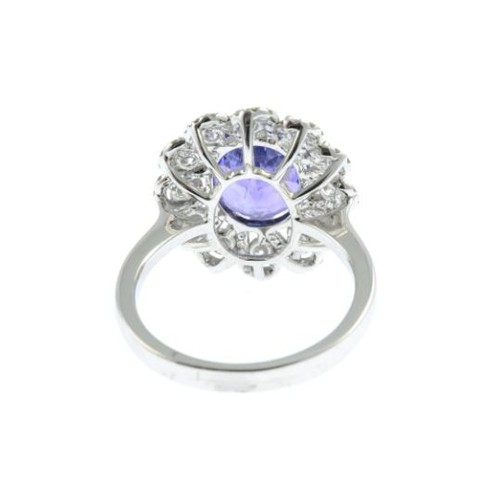 300 - An 18ct Gold tanzanite and diamond dress ring. Tanzanite weight 3.71cts. Total diamond weight 0.99ct... 