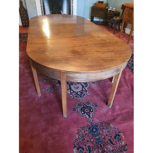 131 - A Georgian Mahogany Dining room Table of simple form with two extra leaves on square supports and wi... 