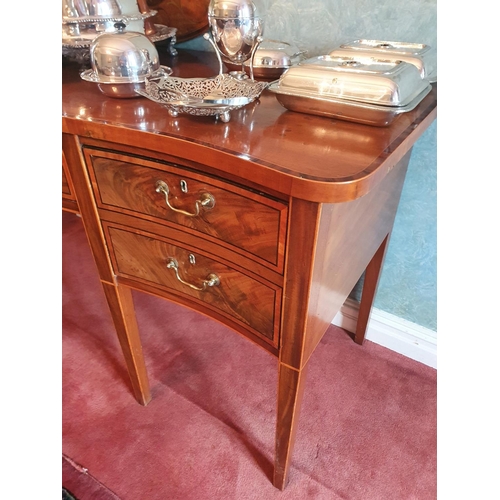 134 - A Superb early 19th Century Mahogany Crossbanded Serpentine fronted Sideboard on tapered inlaid supp... 