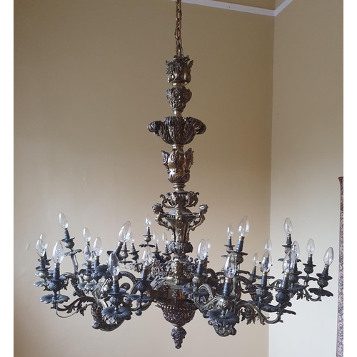 240 - A Most Magnificent six branch Brass oversized Chandelier profusely decorated with floral decoration.... 