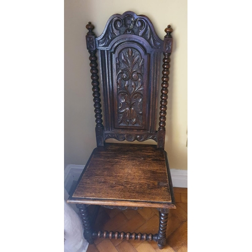 243 - A good single Oak Hall Chair with a carved back and solid seat. H118 x D44 x W52cm approx.