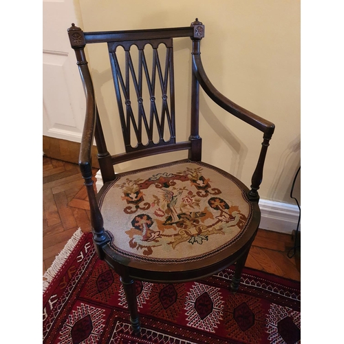 70 - A good set of eight Mahogany Elbow Chairs with lattice backs tapered supports and arms and tapestry ... 