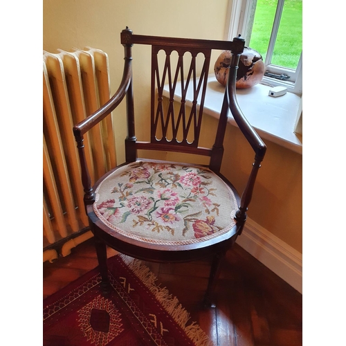 70 - A good set of eight Mahogany Elbow Chairs with lattice backs tapered supports and arms and tapestry ... 