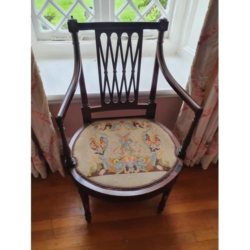 70 - A good set of eight Mahogany Elbow Chairs with lattice backs tapered supports and arms and tapestry ... 