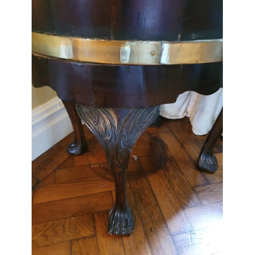 71 - A really good Georgian Irish Wine Cooler with brass crossbanded top on hairy paw supports. 64 x 46 x... 