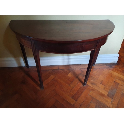 72 - An early 19th Century Mahogany half moon Side Table on moulded tapered supports. W121 x 60 x H71cm a... 