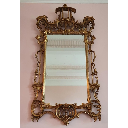 76 - A Magnificent pair of Gilt Wall Mirrors in the Chinese Chippendale taste with highly pierced surroun... 