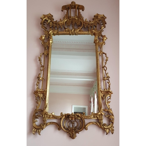 76 - A Magnificent pair of Gilt Wall Mirrors in the Chinese Chippendale taste with highly pierced surroun... 