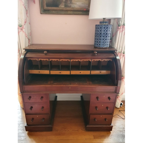 79 - A 19th Century Mahogany Cylinder Pedestal Desk with fully fitted interior and pull slide writing sec... 