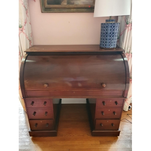 79 - A 19th Century Mahogany Cylinder Pedestal Desk with fully fitted interior and pull slide writing sec... 