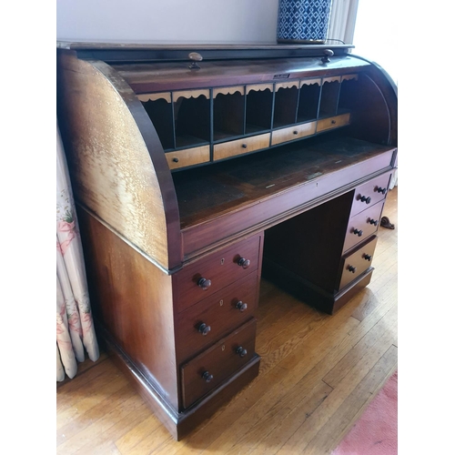 79 - A 19th Century Mahogany Cylinder Pedestal Desk with fully fitted interior and pull slide writing sec... 