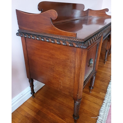 87 - A Fabulous early 19th Century Mahogany Irish Sideboard, possibly Cork, with roped moulded edge, reed... 