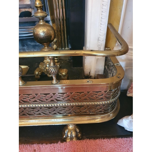 96 - A good 19th Century pierced Brass Fender with claw feet supports. H28 x D31 x W136cm approx., along ... 