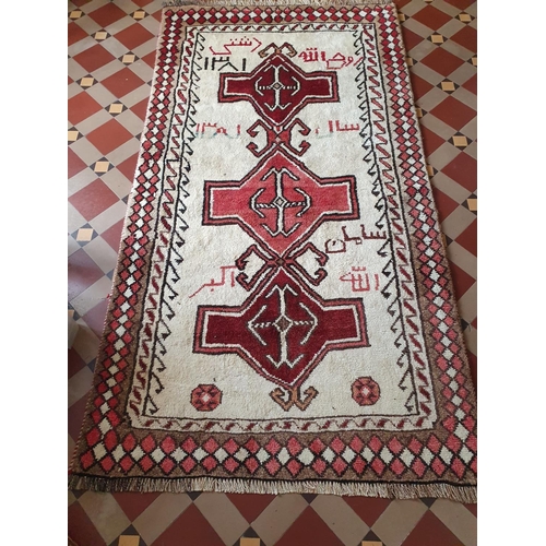 234 - A handwoven naturally dyed Persian Qashqai nomadic Rug, triple medallion design with signatures and ... 