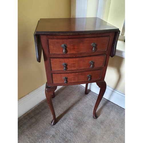 409 - An Edwardian Mahogany Dropflap Side table with triple drawer front. H76 x D34 x W68cm approx.