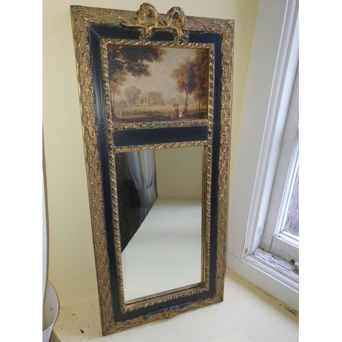 514 - A Decorative Mirror. H55 x W25cm approx.