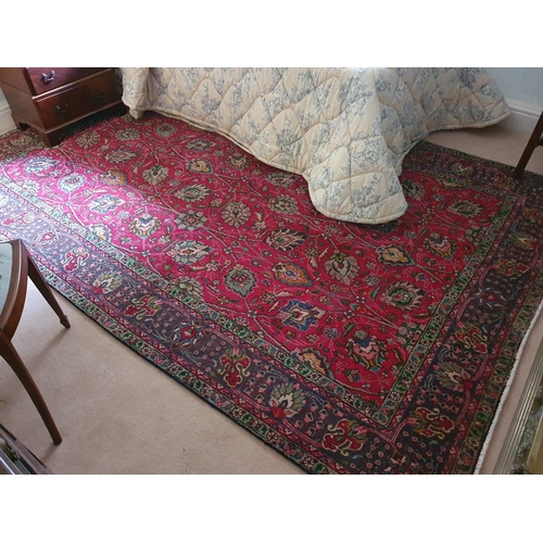 529 - A Rich red ground Persian Tabriz Carpet with unique all over design. 197 x 298cm approx.