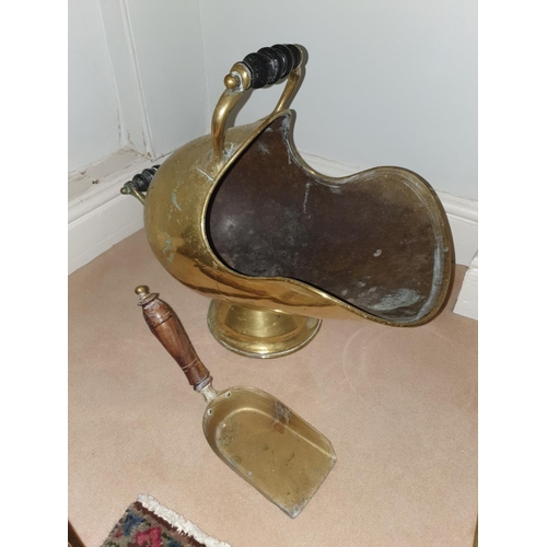 533 - A 19th Century Brass Coal Helmet along with a spark guard. L22 x D35 x W143cm approx.