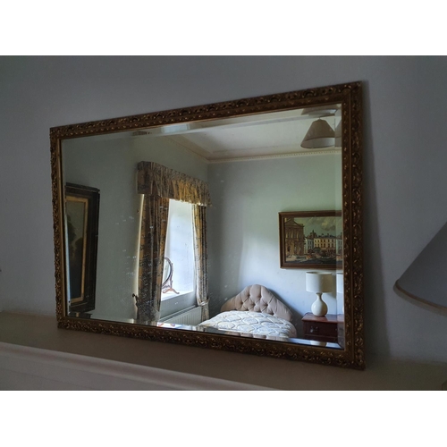 538 - A 20th Century Gilt bevelled edge Mirror. H57 x W83cm approx along with an Arts and Crafts Mirror.