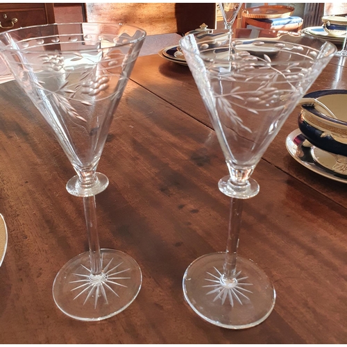 548 - A really good quantity of eleven Edwardian Crystal Sundae Dishes with etched outline.