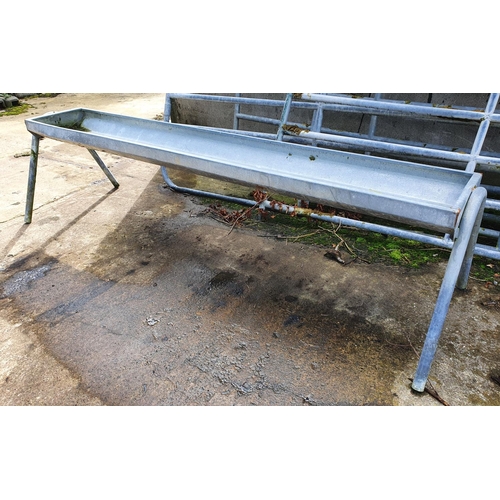 732 - A Galvanised Feeding Trough. H64 x D40 x W259cm approx.