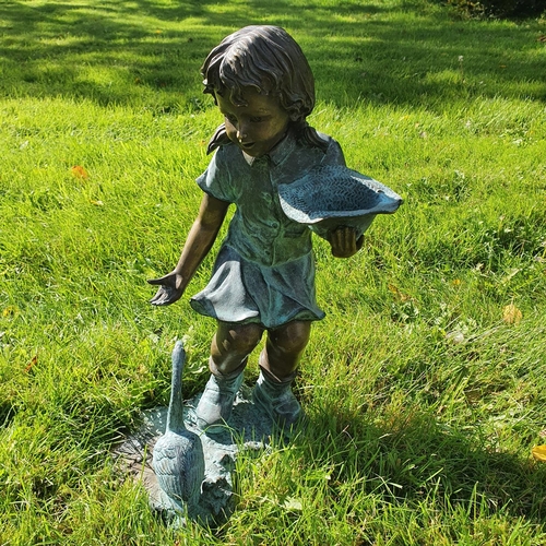 747 - A really good Bronze Figure of a Girl feeding Geese. H54cm approx.