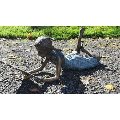 749 - A really good Bronze Figure of a Girl reading. L56cm approx.