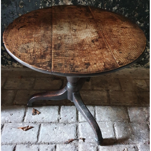 761 - A Provincial 18th Century Oak circular Table. H69 x Diam.75cm approx.