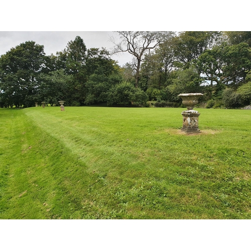 783 - A Fabulous set of four Stone Urns on stands with ribbed detail. H 97 cm. Stand 53 cm, Urn 44 cm appr... 