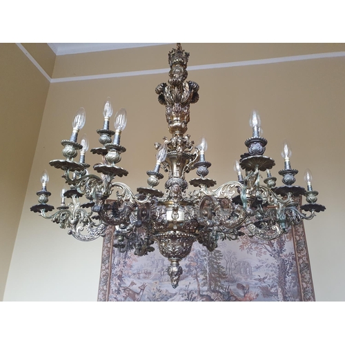 240 - A Most Magnificent six branch Brass oversized Chandelier profusely decorated with floral decoration.... 