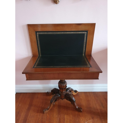 77 - A really good pair of late 19th Century Walnut fold over Card Tables on carved pod bases.