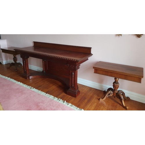 77 - A really good pair of late 19th Century Walnut fold over Card Tables on carved pod bases.