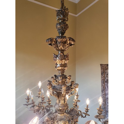 240 - A Most Magnificent six branch Brass oversized Chandelier profusely decorated with floral decoration.... 