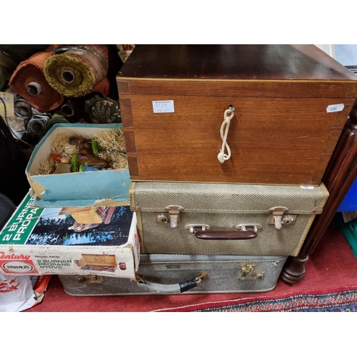59 - A quantity of Vintage cases and a part nativity set.